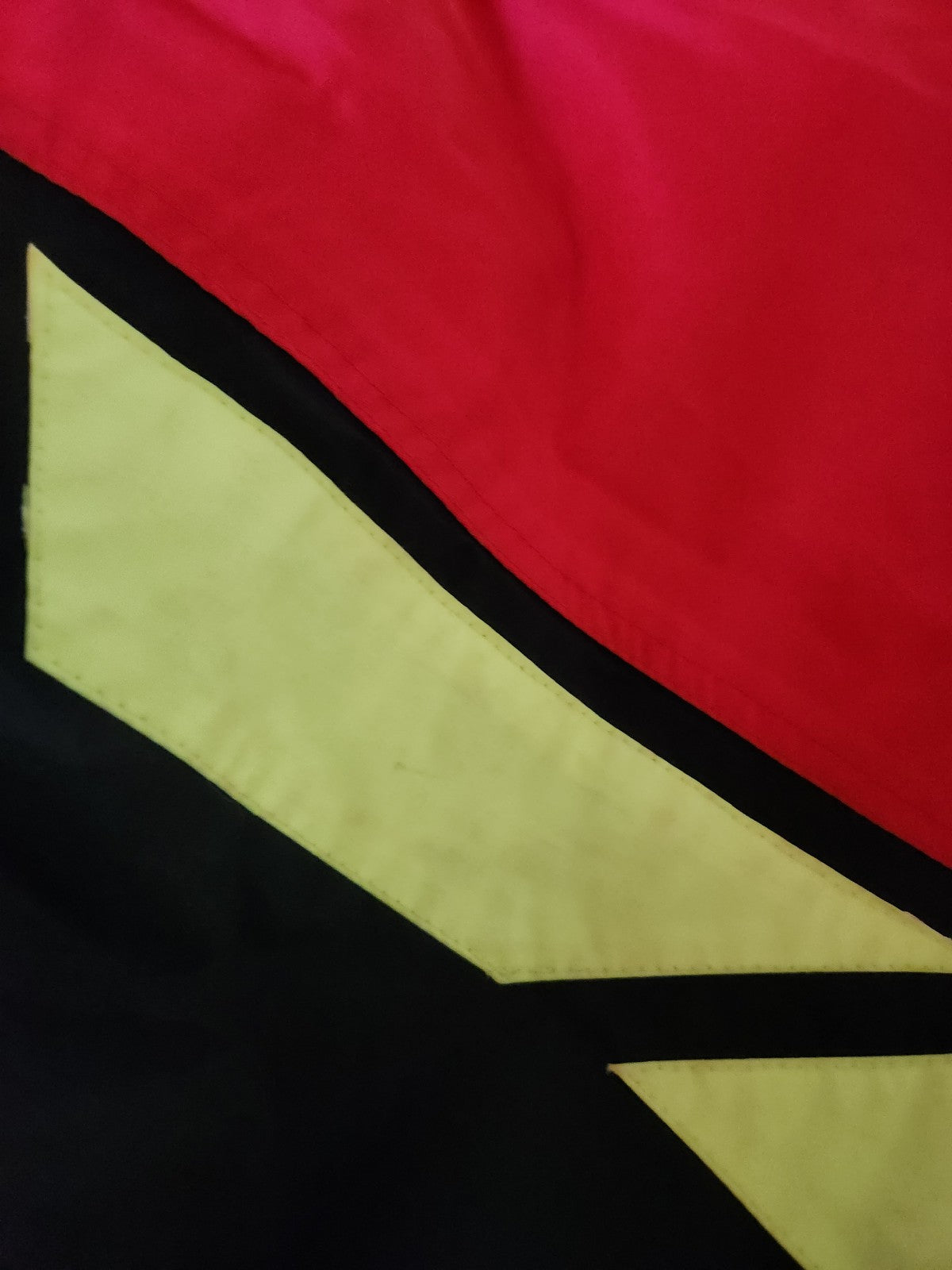90s Red, Black, and Yellow Ski Jacket and Gloves