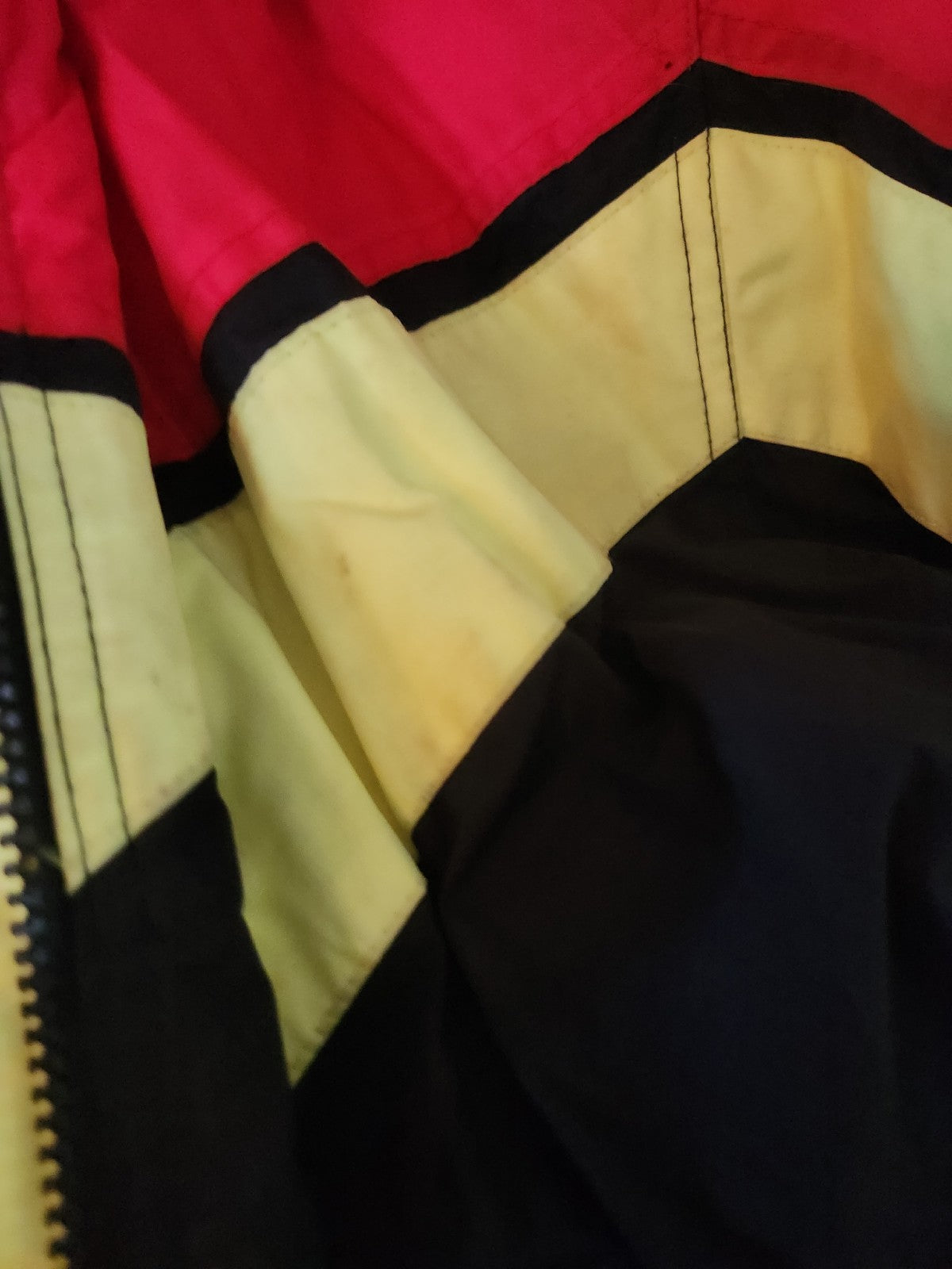 90s Red, Black, and Yellow Ski Jacket and Gloves