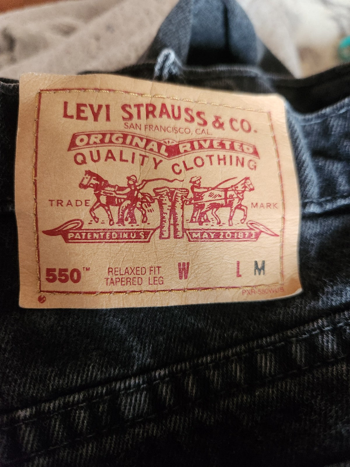 90s Levi's 550 Black Relaxed Tapered Leg Jeans